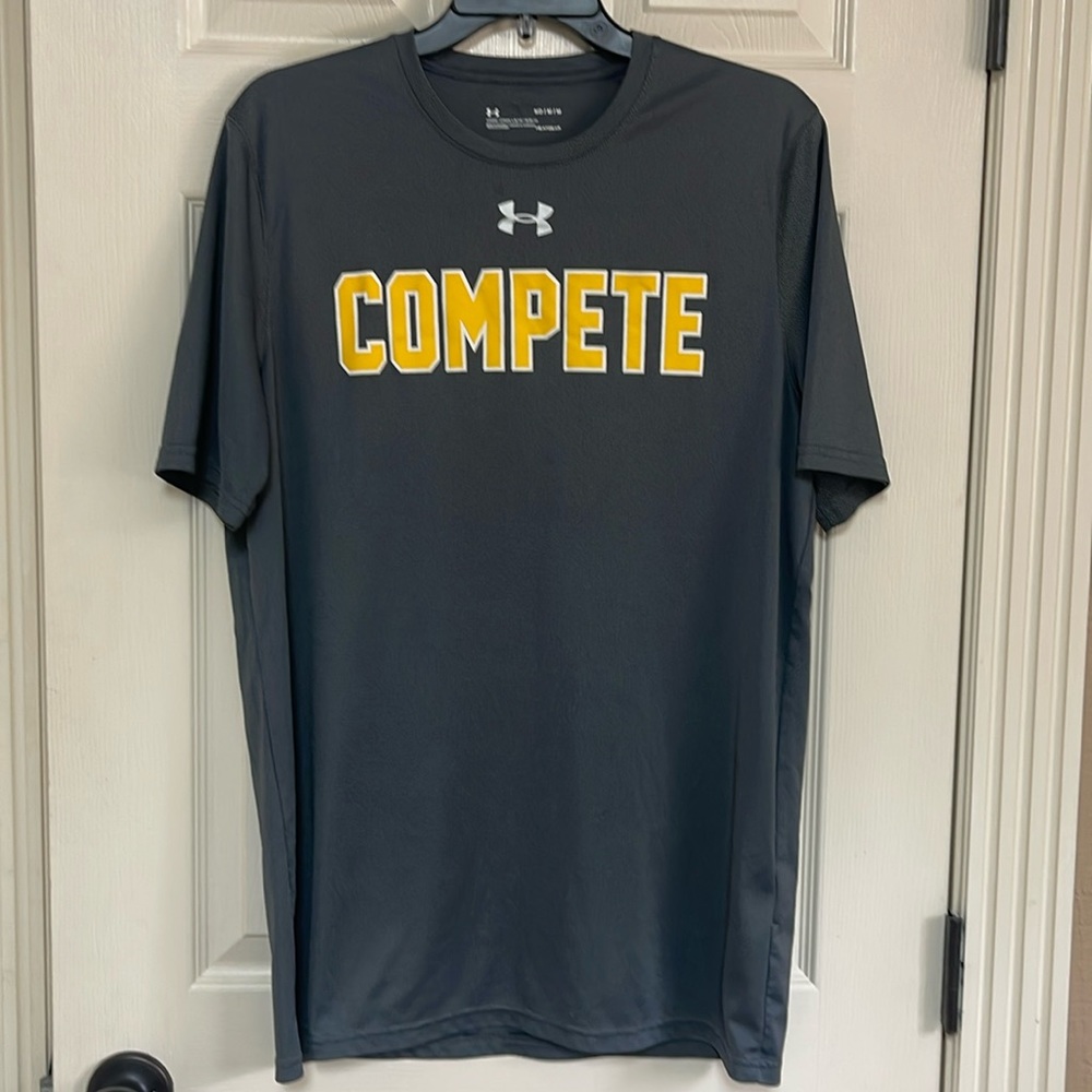 Under Armour loose heatgear short sleeve shirt. “COMPETE”. Size medium.
